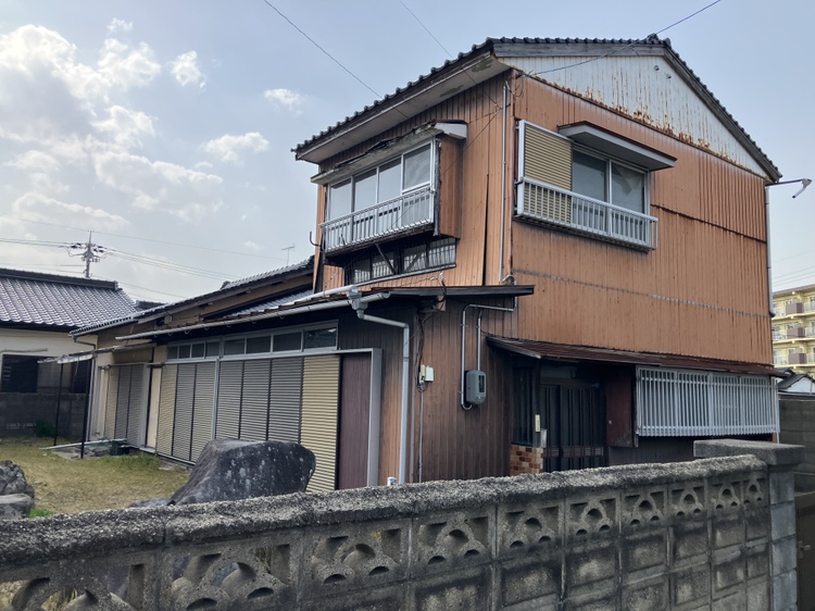 妻崎開作　売地　古家付現況渡しの外観